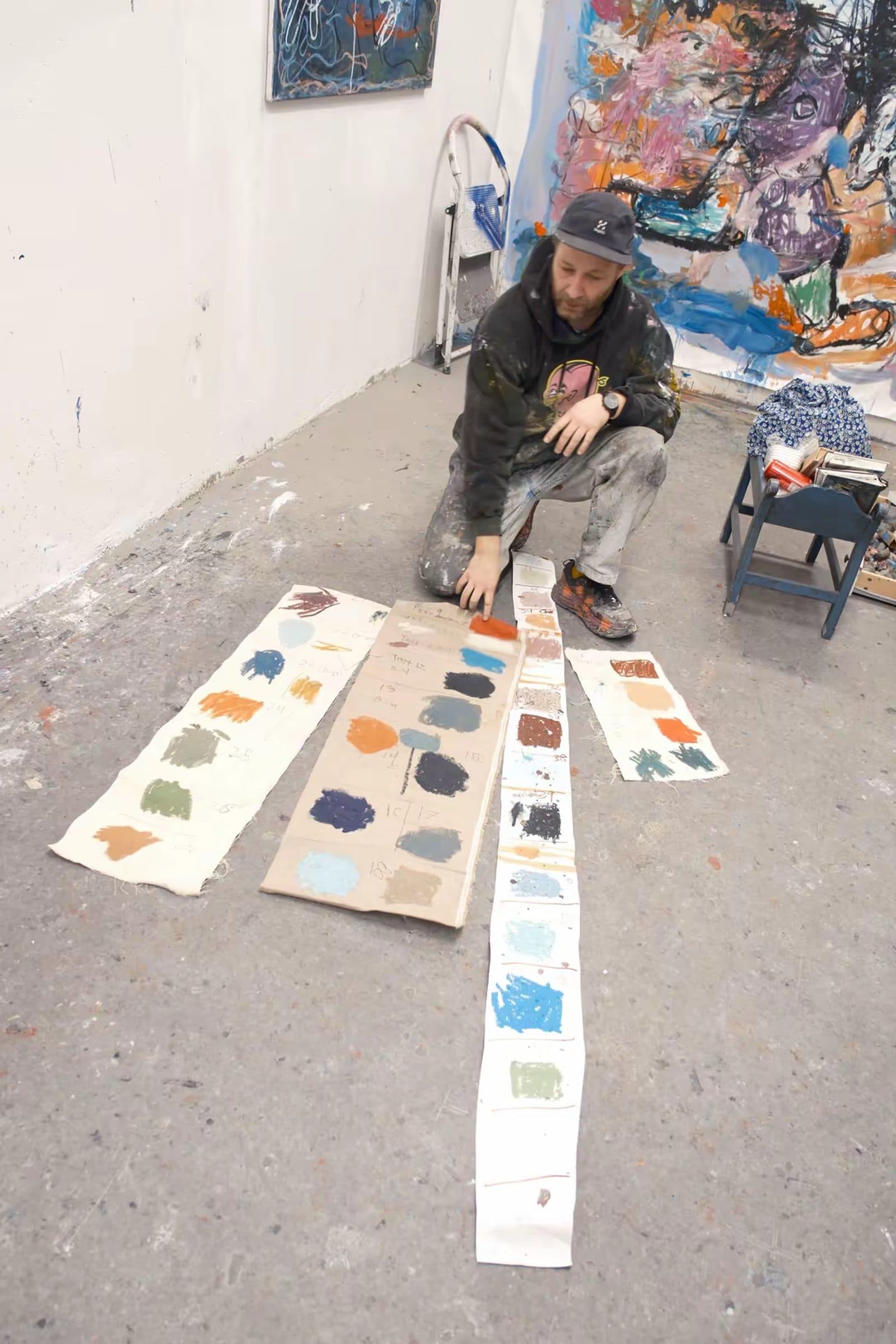 Paintings in progress on the studio wall